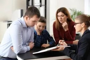 Family talking to a lawyer