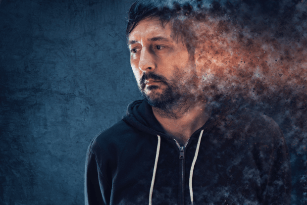 Man in black zip up jacket